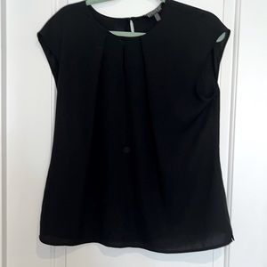 Black scoop neck blouse with peekaboo neck detail